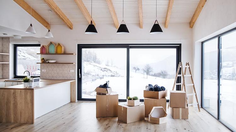 Moving boxes in the kitchen on a winter day.